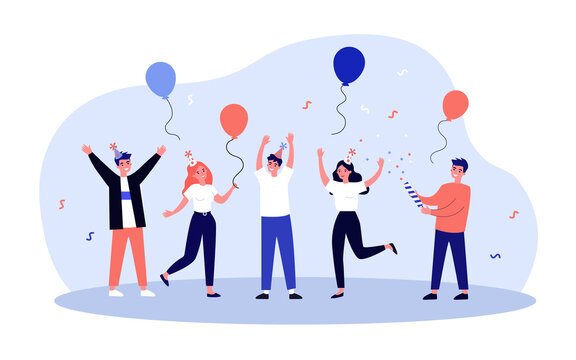 Cheerful friends having fun at birthday party. Happy people dancing with air balloons and confetti. Excited office girls and guys celebrating success together