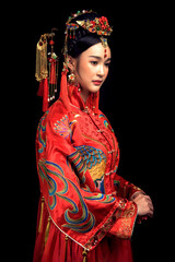 Fototapeta premium Bride in Asian costume in black background