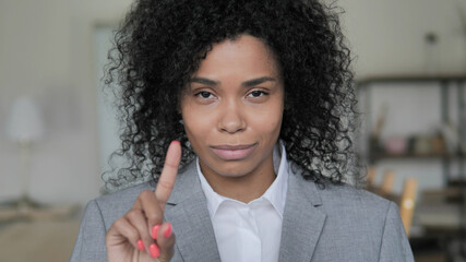 No, African Businesswoman Waving Finger to Reject