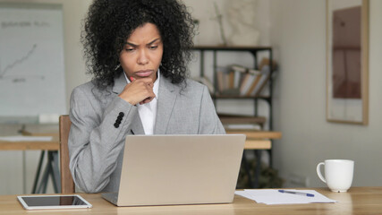 Pensive African Businesswoman Thinking New Plan