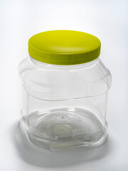 plastic transparent container with green lid