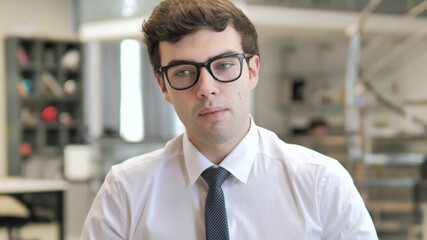 Sad Young Businessman Feeling Upset for Loss