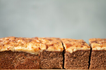 Selective focus of square slice toffee cake