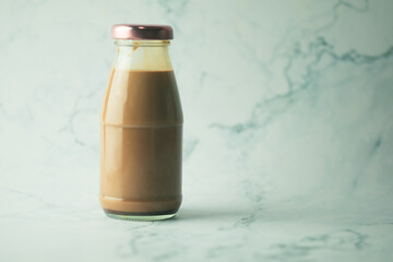 Cool coffee mocha in glass bottle