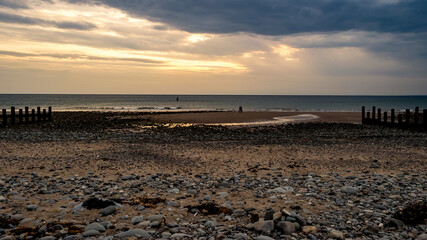 sunset on the rocky beach, Barmouth, Wales, United Kingdom, Europe