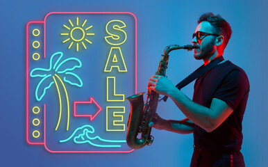 Young jazz musician playing the saxophone on gradient studio background in neon light neon sign...