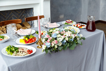 Table decorations for holidays and wedding dinner. Table set for holiday, event, party or wedding reception in outdoor restaurant