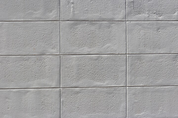 Fototapeta premium wall surface has a white square pattern with shading