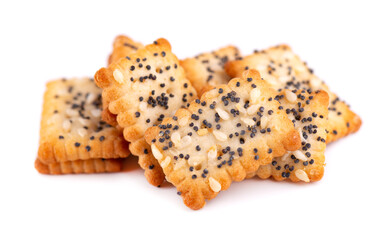 Square poppy seeds and sesame crackers isolated on white background. Dry cracker cookies isolated. Salty snacks isolated.