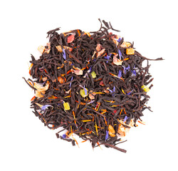 Black Ceylon tea with candied fruit, saffron, rose and cornflower petals, isolated on white background. Organic tea. Top view. Close up.