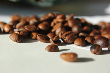 roasted brown coffee beans close up background shot