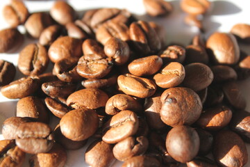 roasted brown coffee beans close up background shot