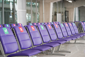 seating sign at the airport showing social distancing 