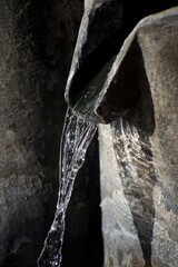 Stone and water in Charcoal 2 - vertical