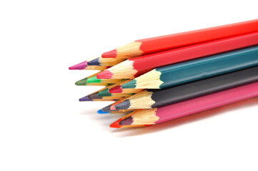  Pencils сolored on a white background close up. Drawing, art