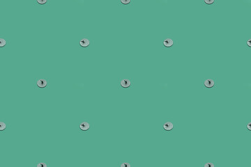 Pattern with push pins on a green background for school design