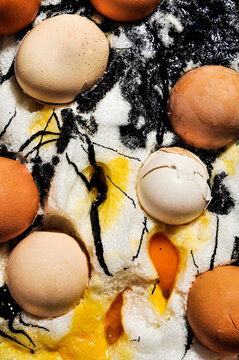 Mix of egg foam, egg yolks, egg shells and paint. 
