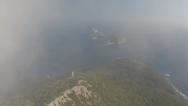 Beautiful islands in the clouds. Mountain landscape from above. Aerial view. 4K 