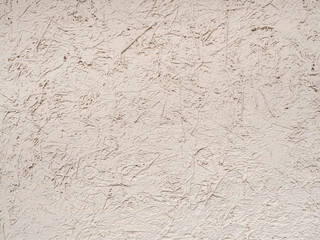 beige mud and straw wall texture.
