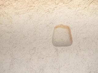 Obraz premium beige mud and straw wall with shelf texture.