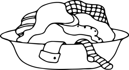 clothes waiting for laundry in a basket