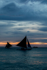 Sunset, white beach path, Boracay island, Philippines.