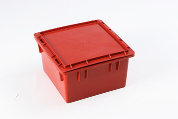 red plastic box, container for storing and transferring fruits and vegetables, for storing things on a white background, online store
