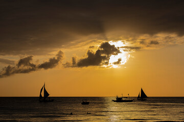 Sunset, white beach path, Boracay island, Philippines.