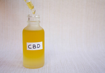 CBD oil in a matte glass bottle for therapeutic use