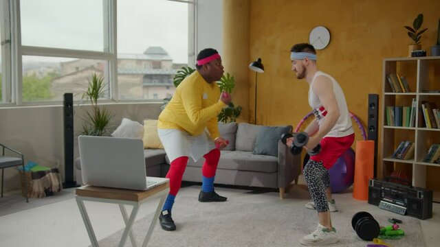 Challenge accepted. Humor sports. Diverse retro fitness guys working on biceps lifting up unequal dumbbells competing with each other. Home training.