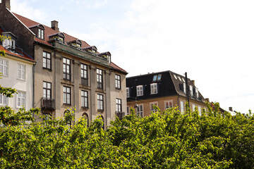 Facade of a building. Apartment block. Old house in Copenhagen. Expensive housing in the center of...