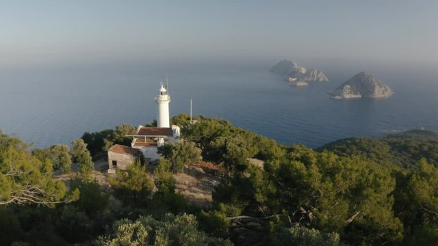 Gelidonya lighthouse in the background of Greek Islands. Between Turkey and Greece. Aerial view 4K 