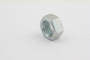 Nut, a fastener with a threaded hole that forms a collapsible connection using a screw, bolt or stud., for business, on a white background, online store