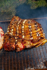 Beef ribs on the grill roasting