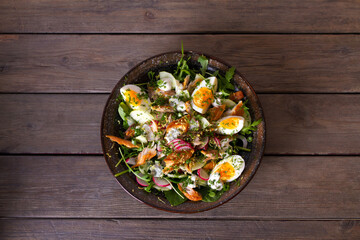 Smocked mackerel salad with eggs and radish. Healthy diet food. View from above, top studio shot