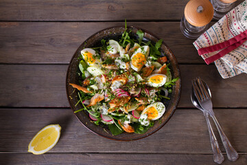 Smocked mackerel salad with eggs and radish. Healthy diet food. View from above, top studio shot
