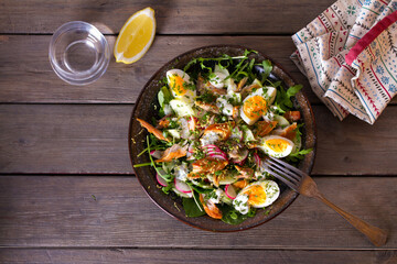 Smocked mackerel salad with eggs and radish. Healthy diet food. View from above, top studio shot