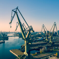 Gdansk Harbor Aerial View. Cranes at the famous shipyard of Gdansk, Pomerania, Poland. - obrazy, fototapety, plakaty