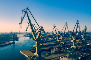 Gdansk Harbor Aerial View. Cranes at the famous shipyard of Gdansk, Pomerania, Poland. - obrazy, fototapety, plakaty