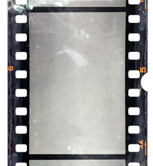empty 35mm film frame with scratches, macro photo of film material