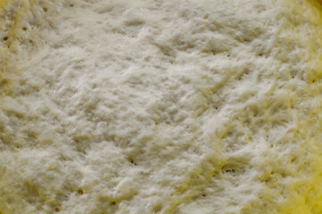 Raw focaccia dough close up texture. Traditional Italian Focaccia homemade flat bread focaccia.