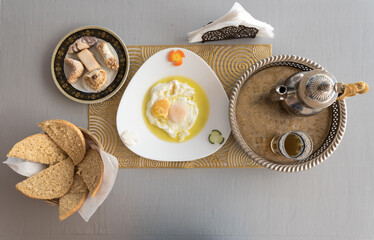Delicious breakfast in Moroccan style served in riad (traditional Moroccan hotel)
