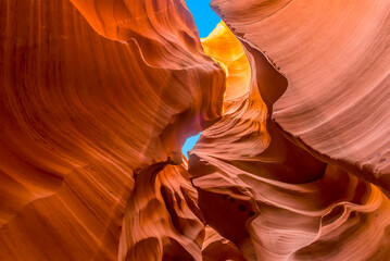 A view from the bottom of the canyon looking up to the sky close to the entrance to Lower Antelope, Canyon, Page, Arizona