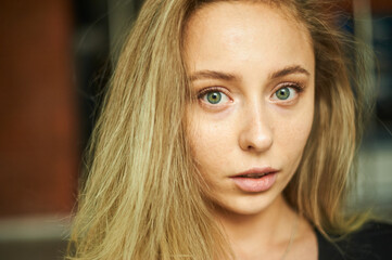 Close up of curly charming woman