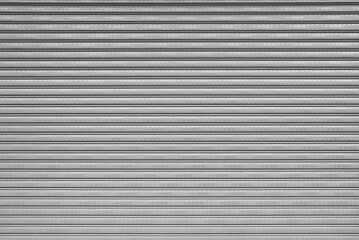 Obraz premium White roller shutter door texture background, corrugated metal sheet, Slide door, architecture design
