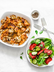 Roasted french mustard chicken breast with cauliflower cabbage and fresh tomatoes, cucumbers,...