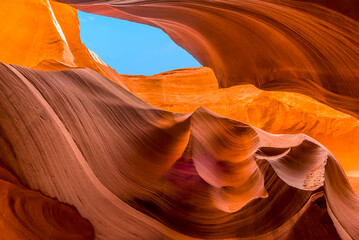 A view of the sky through a crack in the slot canyon in lower Antelope Canyon, Page, Arizona