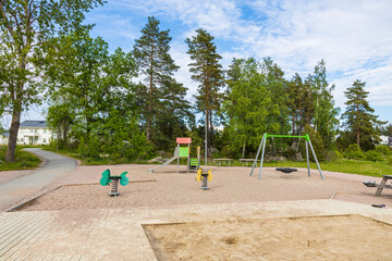 Modern playground with beautiful nature around.  Sweden. Europe.