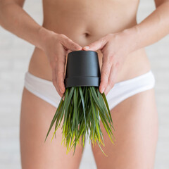 Bikini area depilation. Advertising Brazilian laser bikini line hair removal. A woman in white...