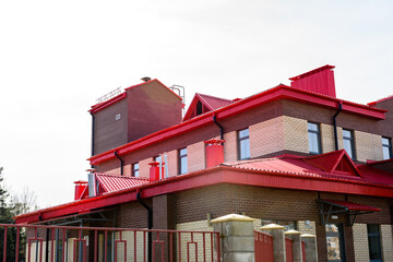 Administrative building. Brick building with windows.